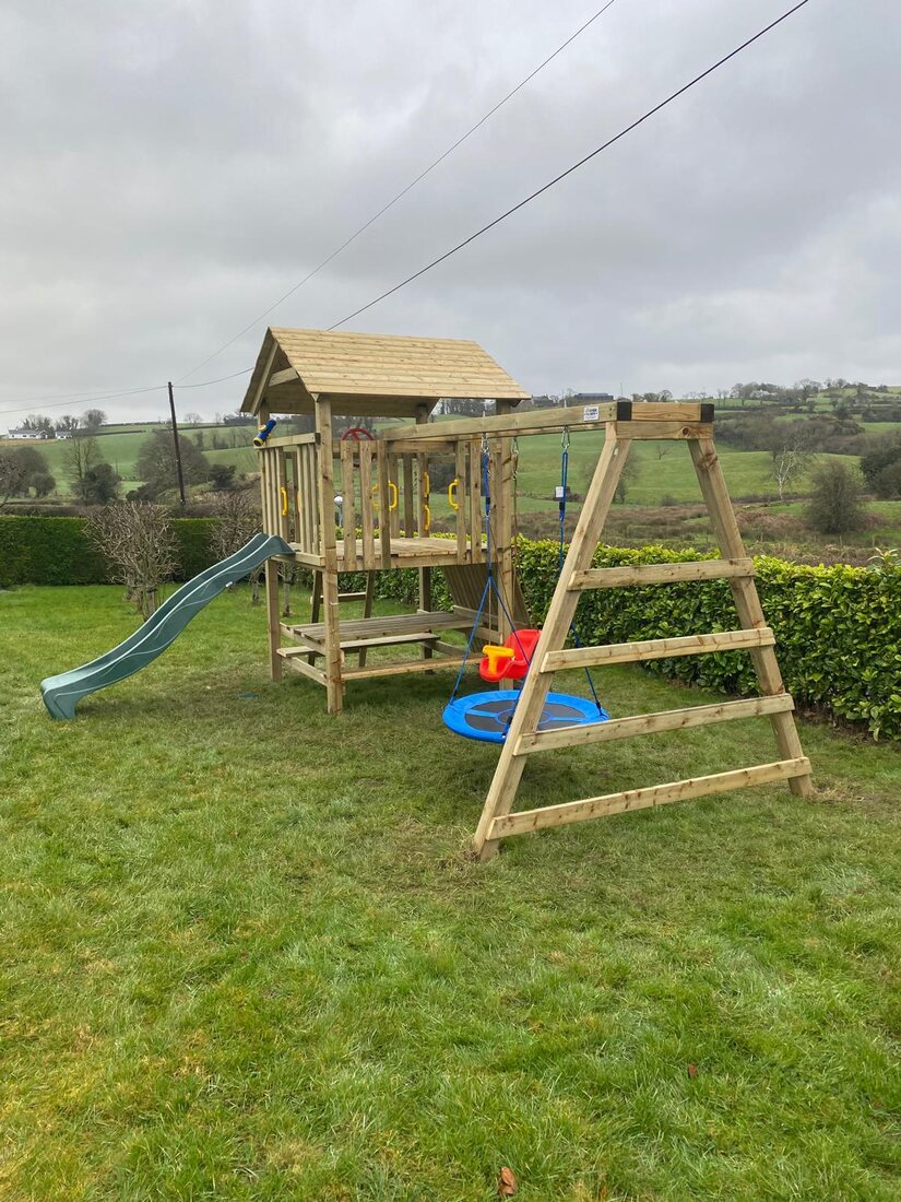 Larger tower set with monkey bars