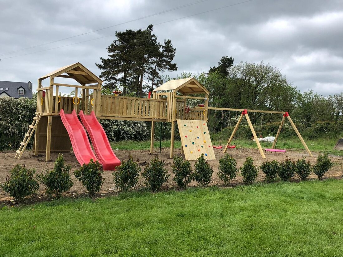 Twin towers playground with two slides