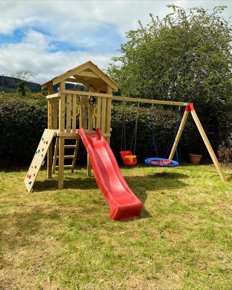 Tower set with slide and swings